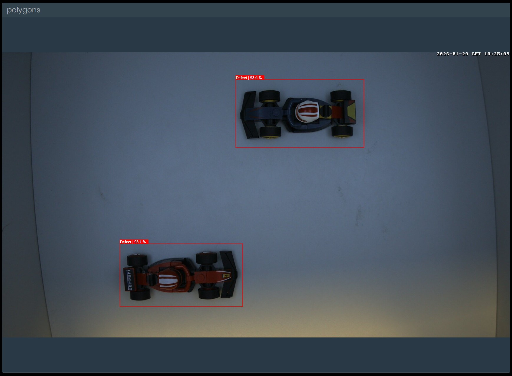 Two detected objects with red bounding boxes labeled Defect with confidence percentages
